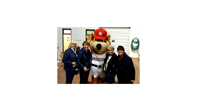 photo of the Vancouver Canadians mascot, Bob Brown Bear, stopping to take a photo with some of us!