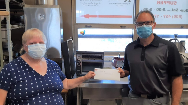 Presenting cheque to Fredericton Community Kitchen