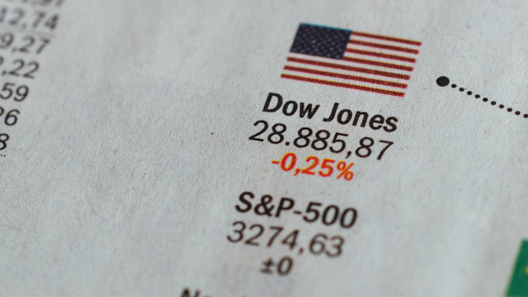 Value of the Dow Jones Industrial Average Index in Financial Section of Newspaper