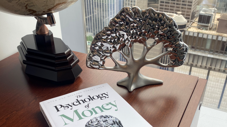 Psychology of Money book and tree logo