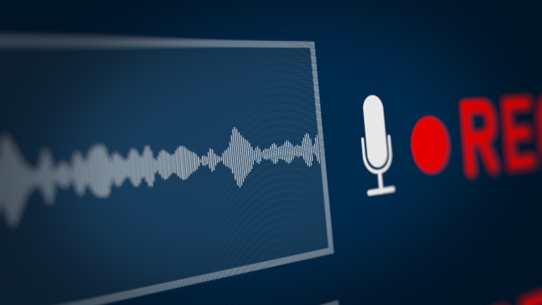 Microphone symbol beside audio track.