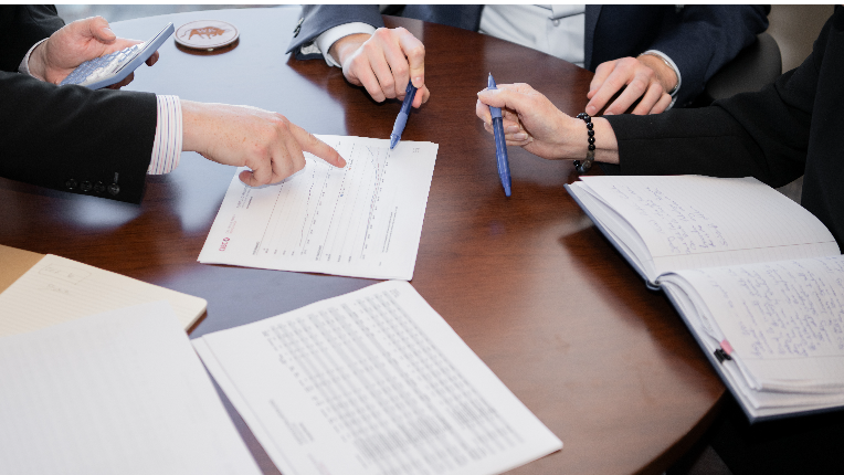 Team calculating Net Worth