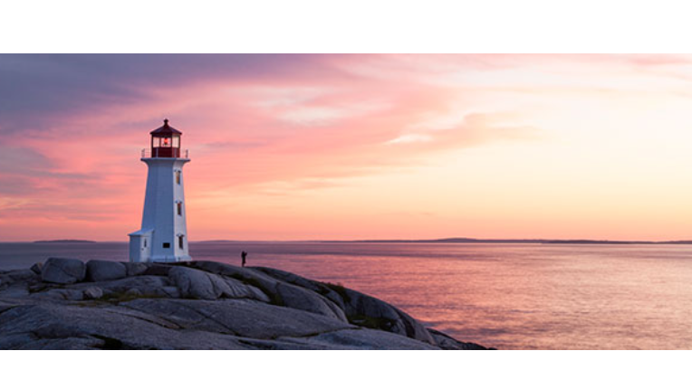 lighthouse on rocky shoreline