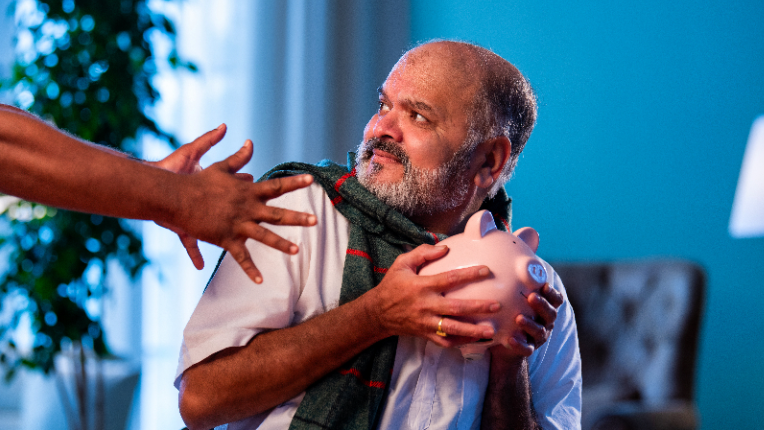 A man wants to hold onto his piggy bank to save more on RRSPs