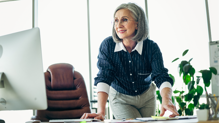 Woman looking at her laptop.