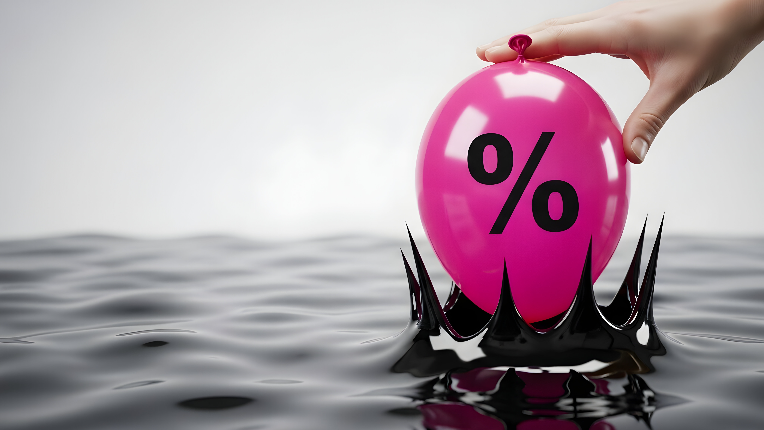 Hand pushing down balloon with percentage symbol into lake of oil.