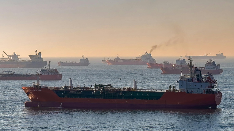 Tankers and transport ships in maritime traffic.