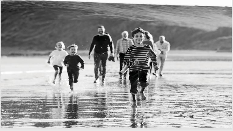 Generational family on the beach