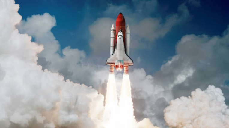 Space shuttle lifting off