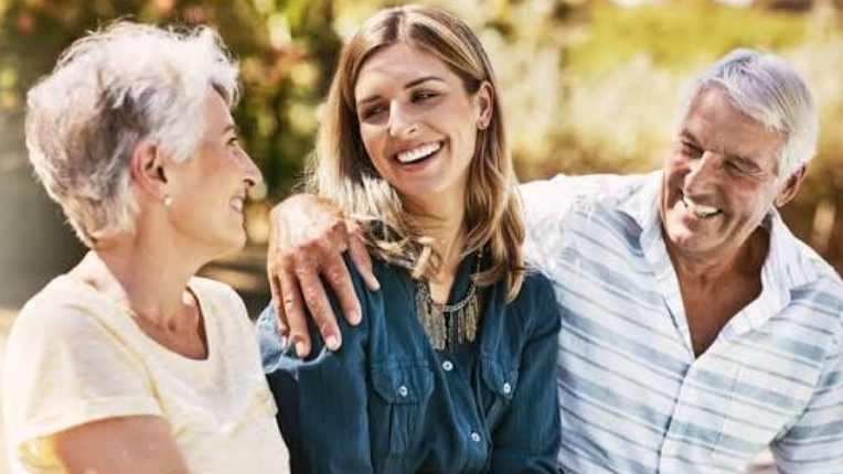 a mother, father and daughter