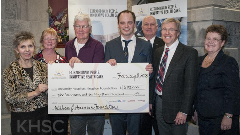 Group photo of presentation of cheque