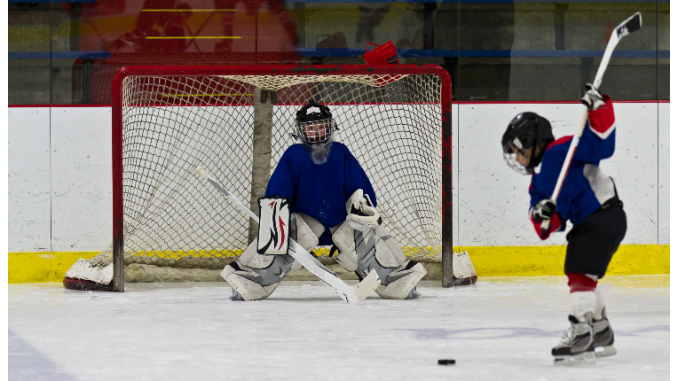 Kids playing hockey