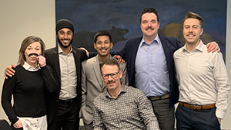 Kevin Punshon and his team showing their mustaches