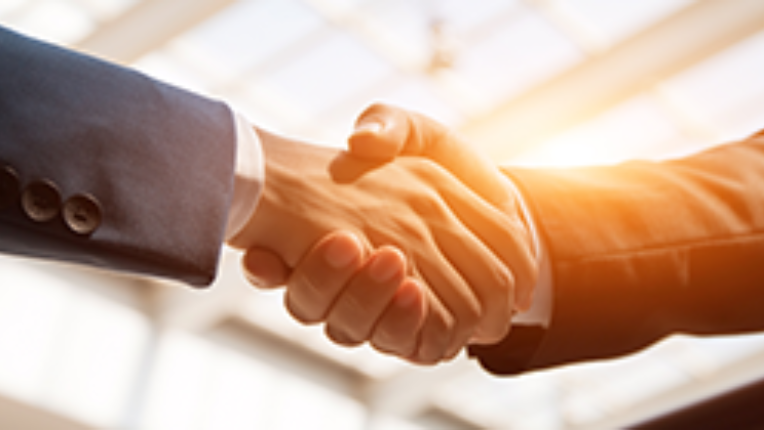 image of a individuals shaking hands