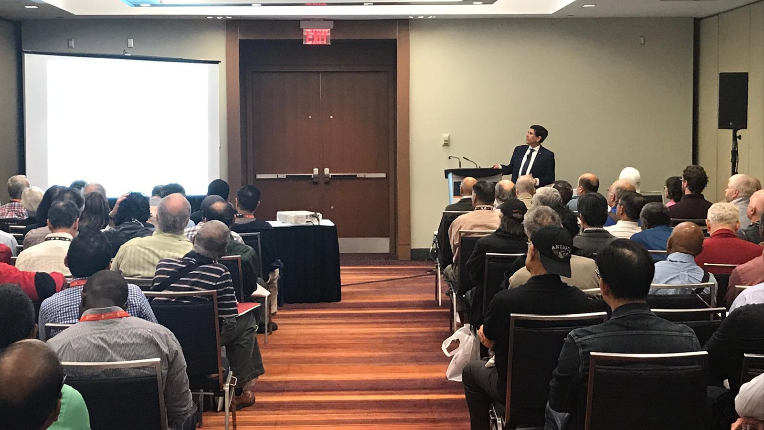 Avin Mehra presenting in front of clients