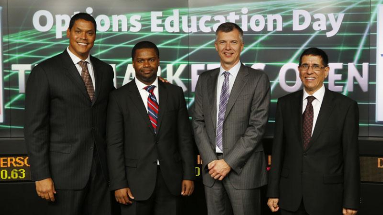 Avin Mehra standing with other people at Options Education Day event.