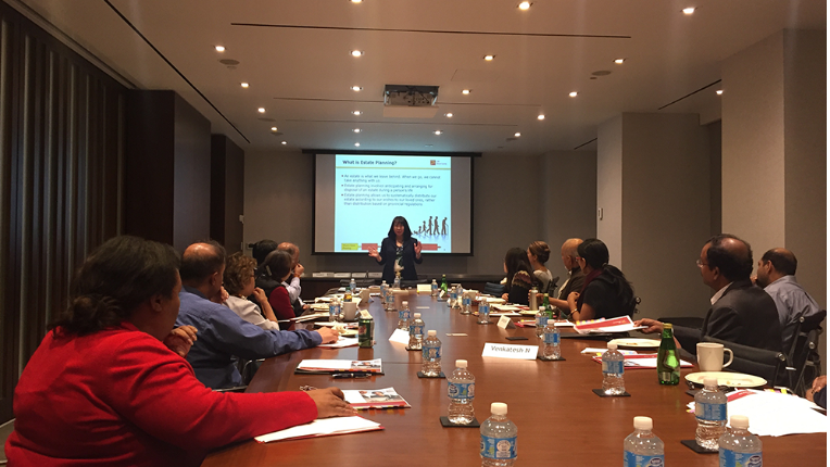 A lady presenting in a meeting room