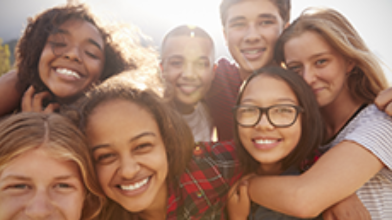 Seven children smiling