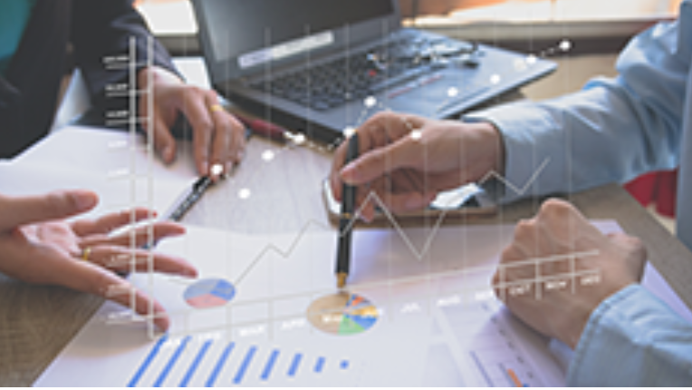 Two people discussing financial planning.