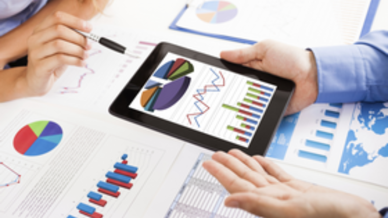 two people looking at a portfolio