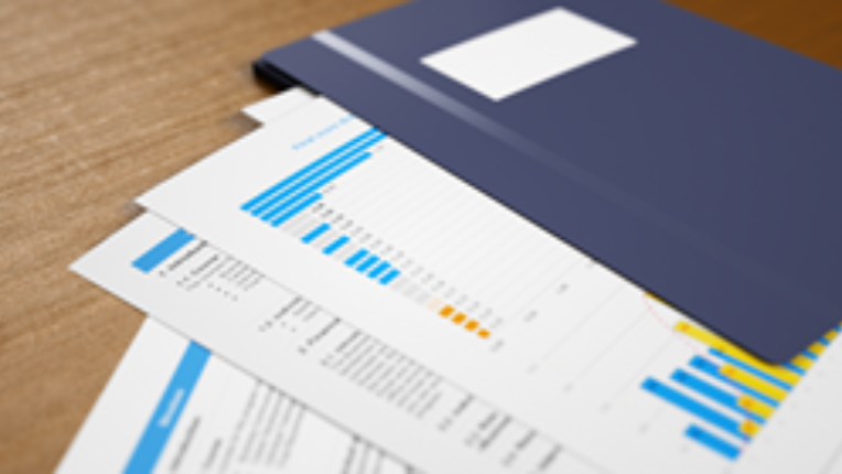 A financial portfolio spread out on a table