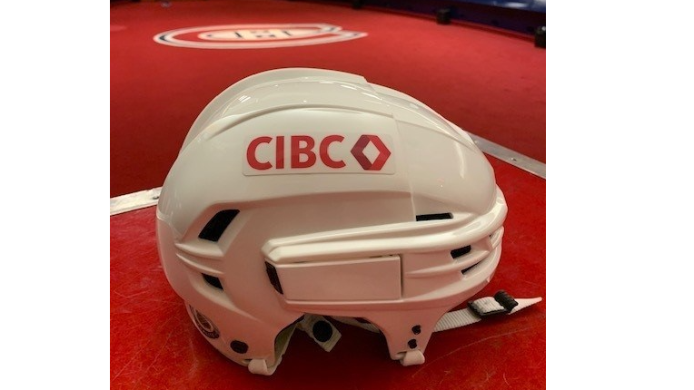 CIBC’s brand adorning the team’s white away helmets. (CNW Group CIBC)