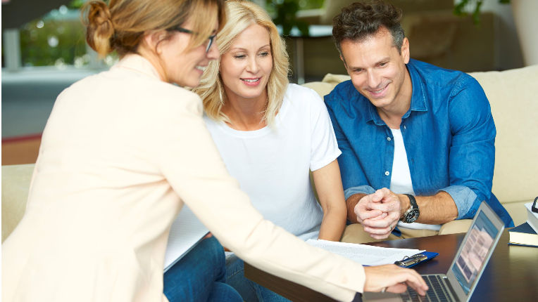a man and a woman consulting with an advisor