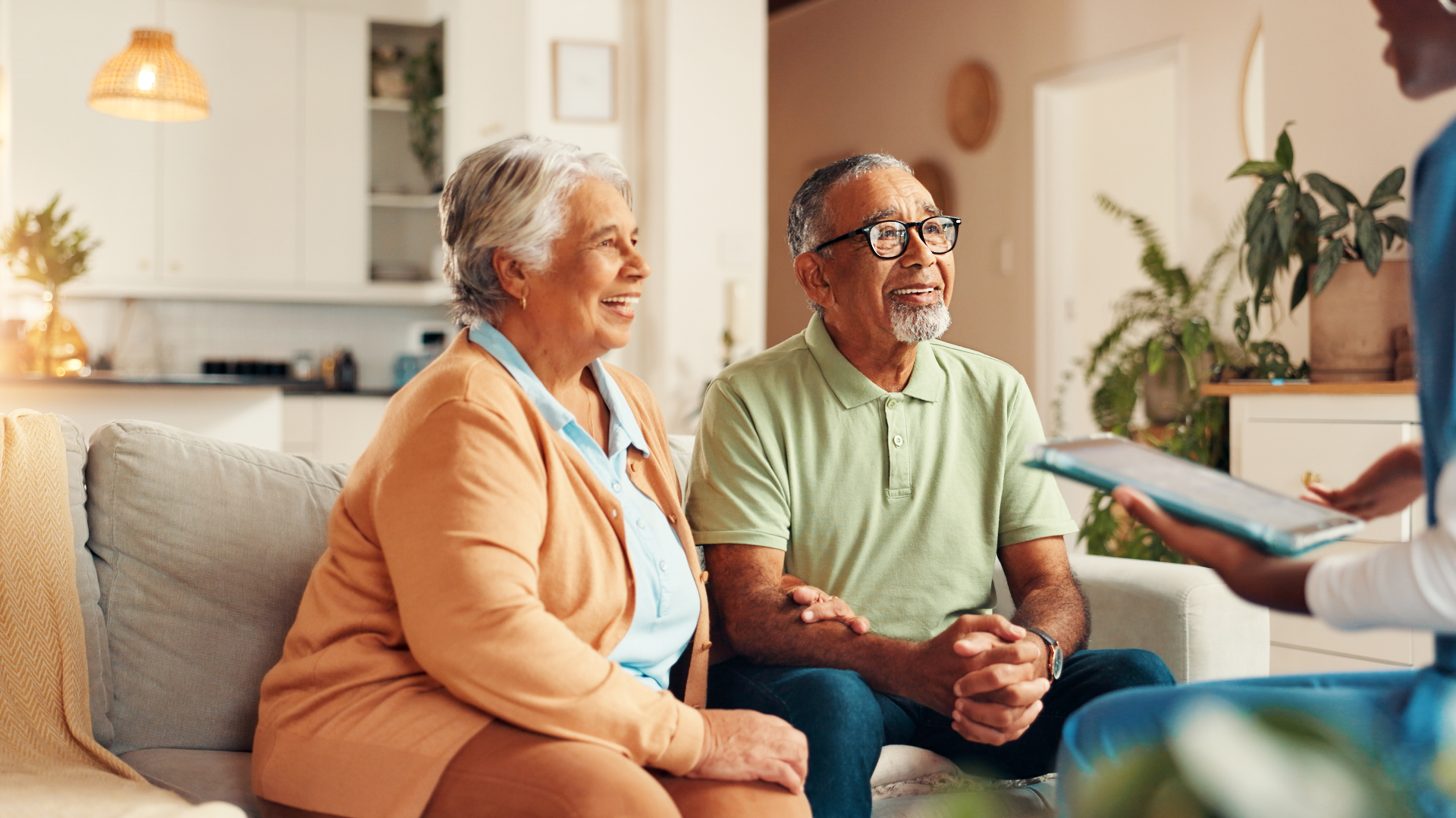an elderly couple sitting