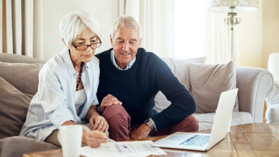senior couple looking at paperwork