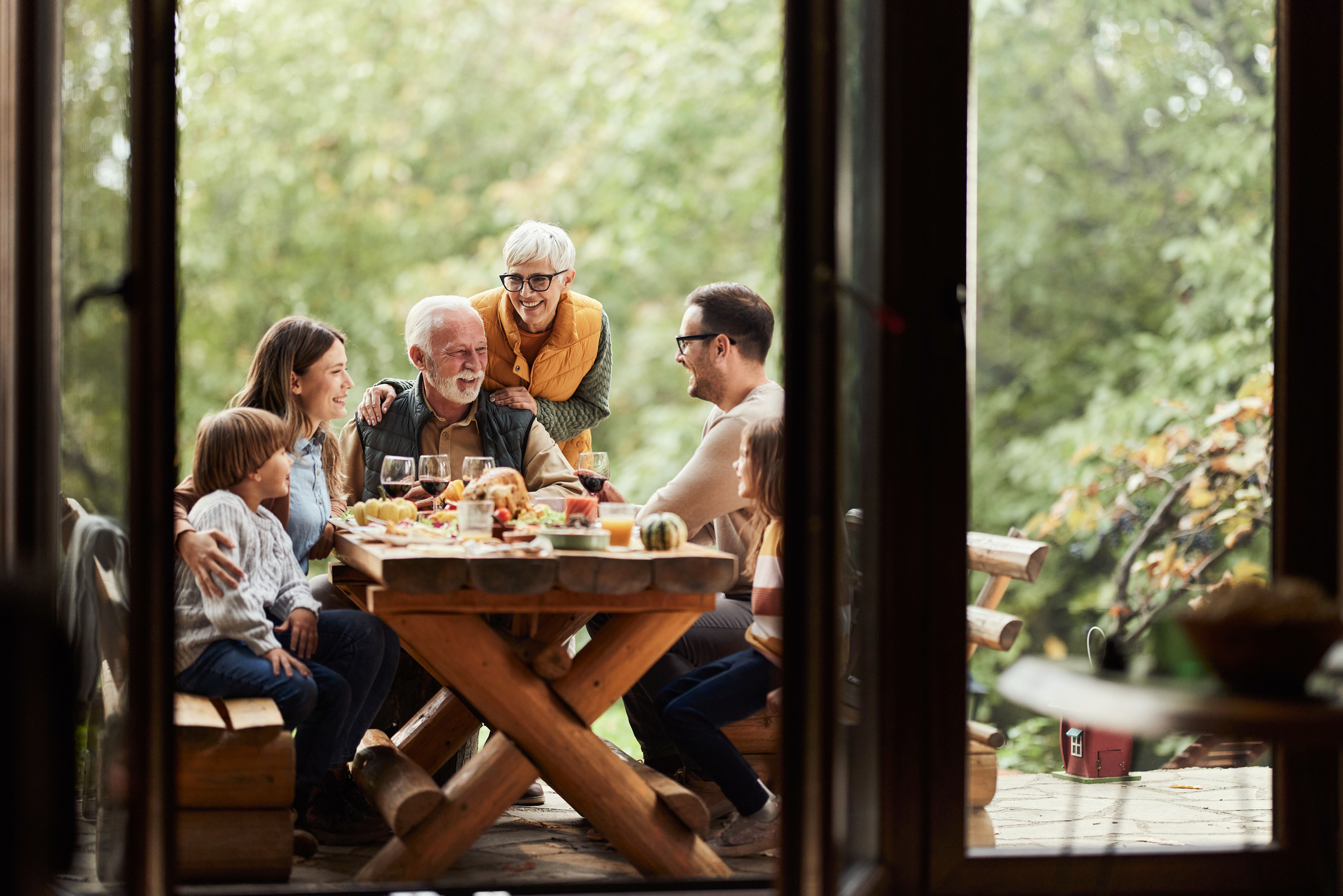 Parents at table with family 