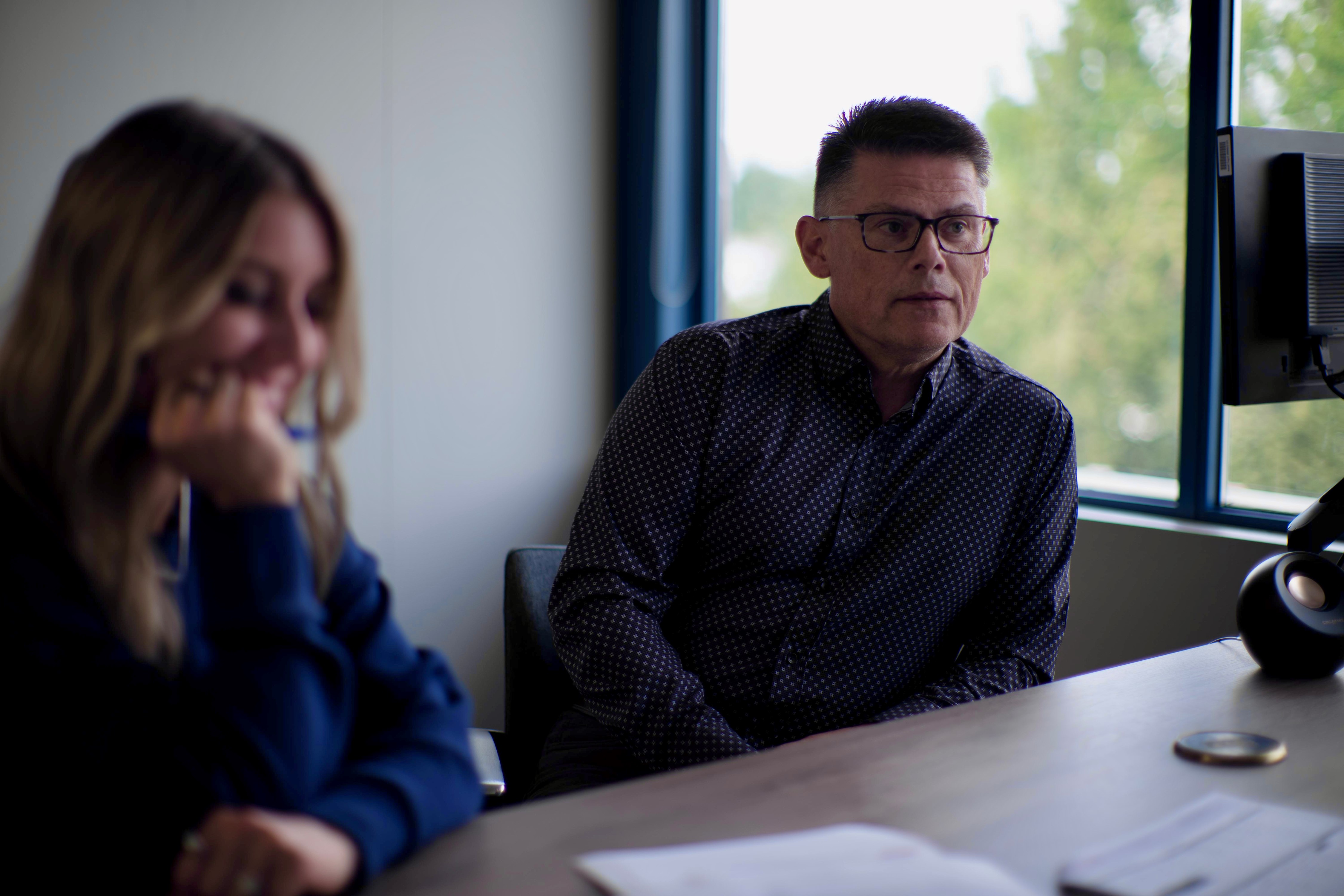 Tracey and Steve at desk