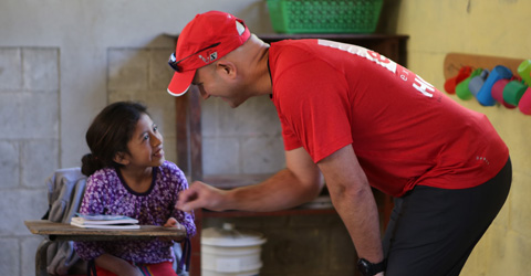 Marvin Schmidt in school with child