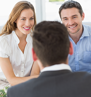 image of an advisor speaking with a couple
